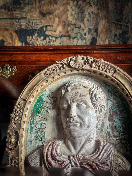 A Pair of Italian Carved Wooden Roundels of Nero and Augustus
