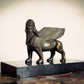 A Grand Tour Bronze of an Assyrian Lamassu