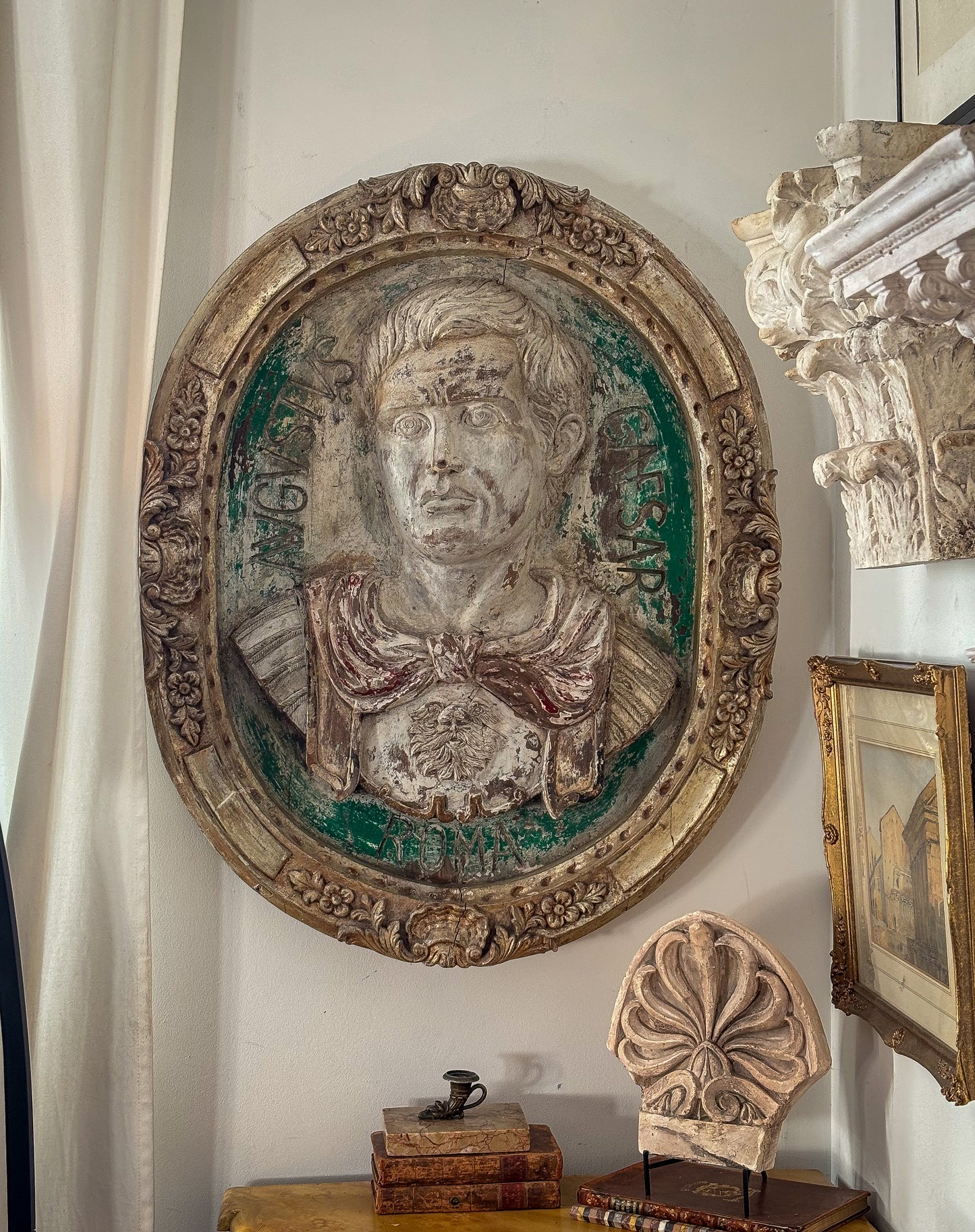 A Pair of Italian Carved Wooden Roundels of Nero and Augustus