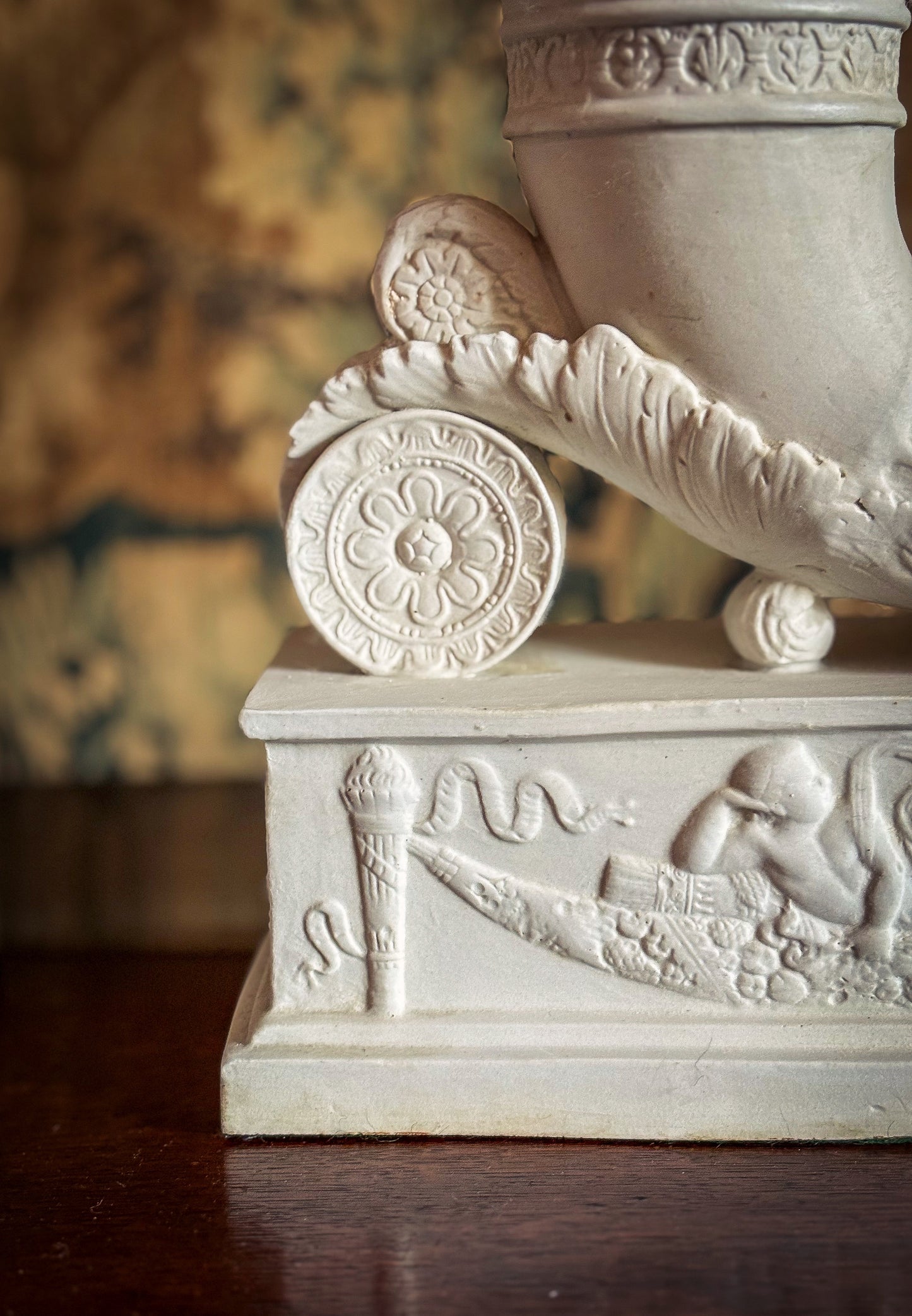 Pair of Continental biscuit porcelain ‘rhyton’ vases, probably German 19th century