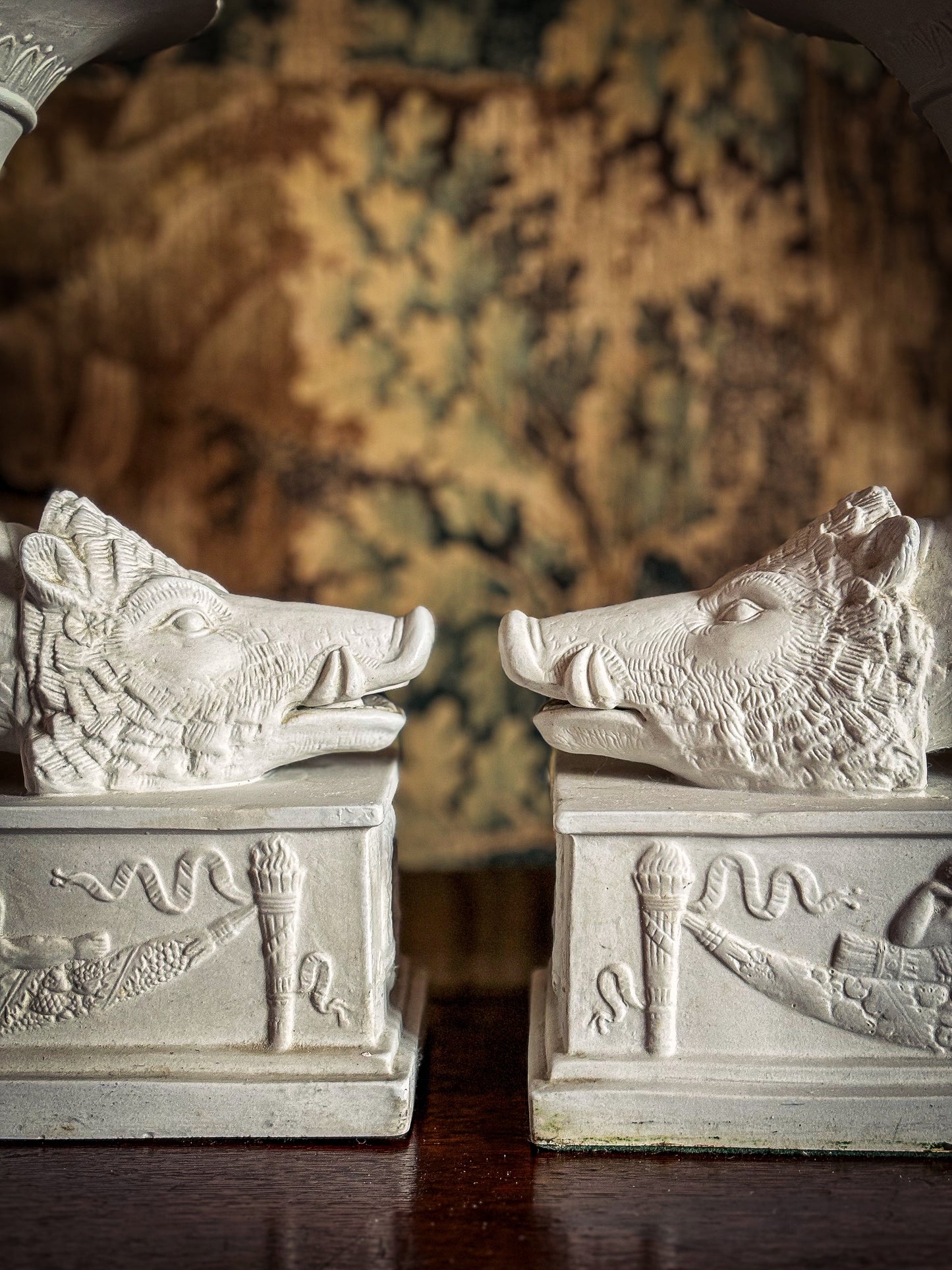 Pair of Continental biscuit porcelain ‘rhyton’ vases, probably German 19th century