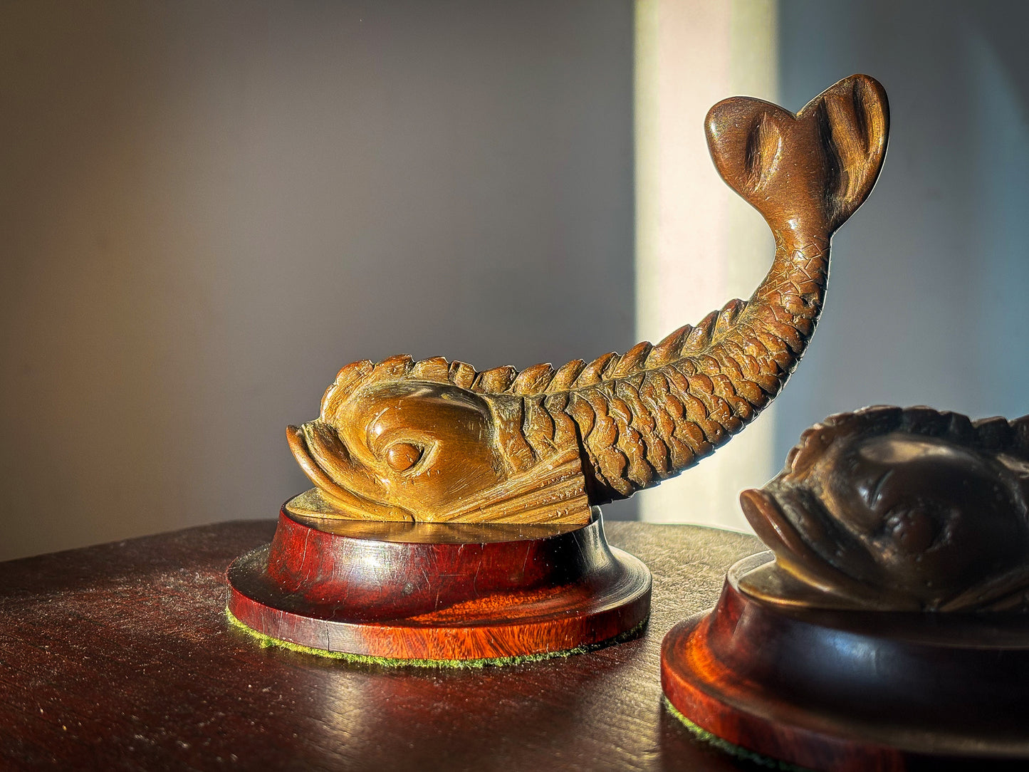 A Pair of 19th Century Classical Revival Bronze Dolphin Supports