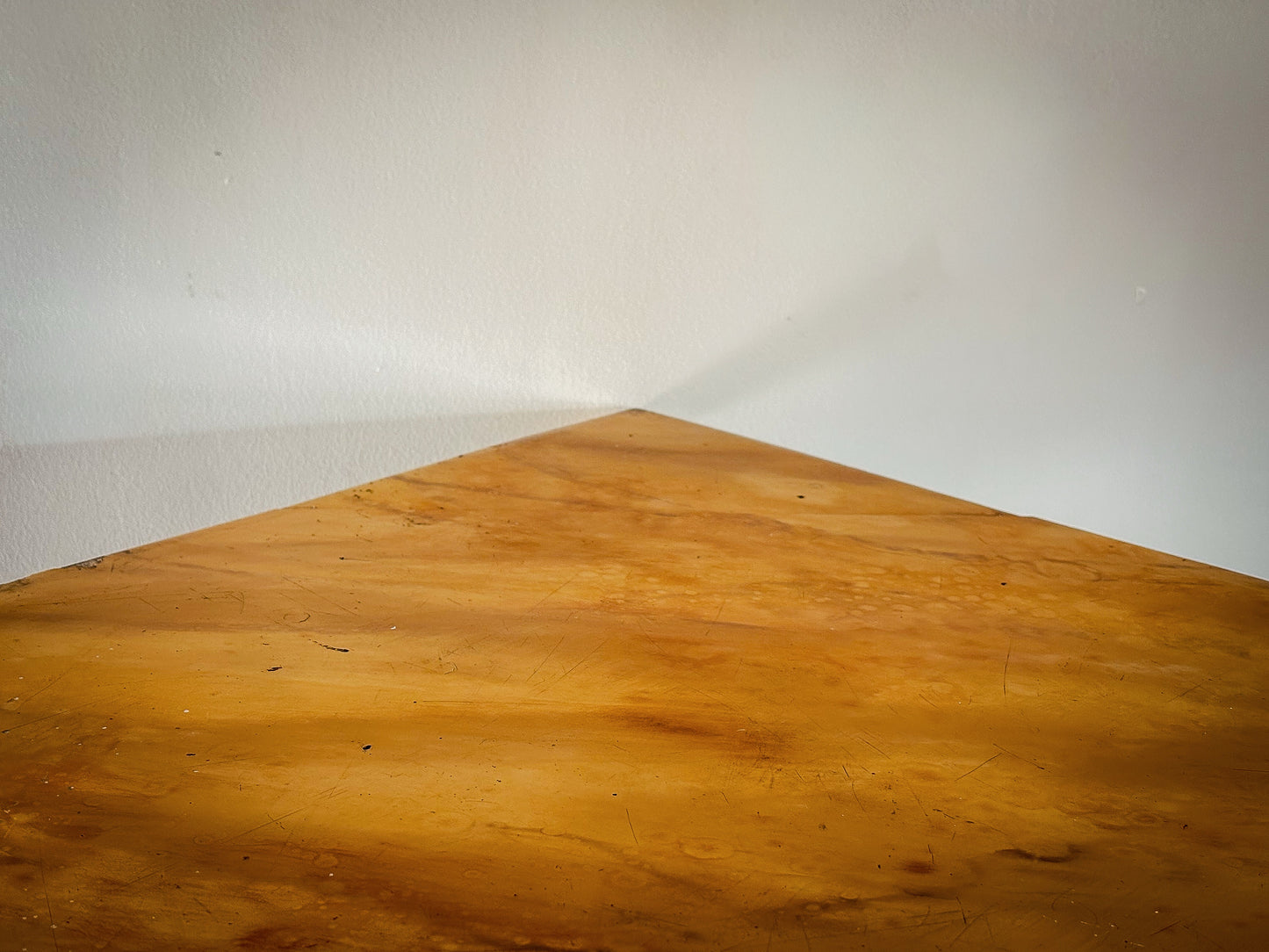 A MID-19TH CENTURY ENGLISH PAINTED CORNER TABLE