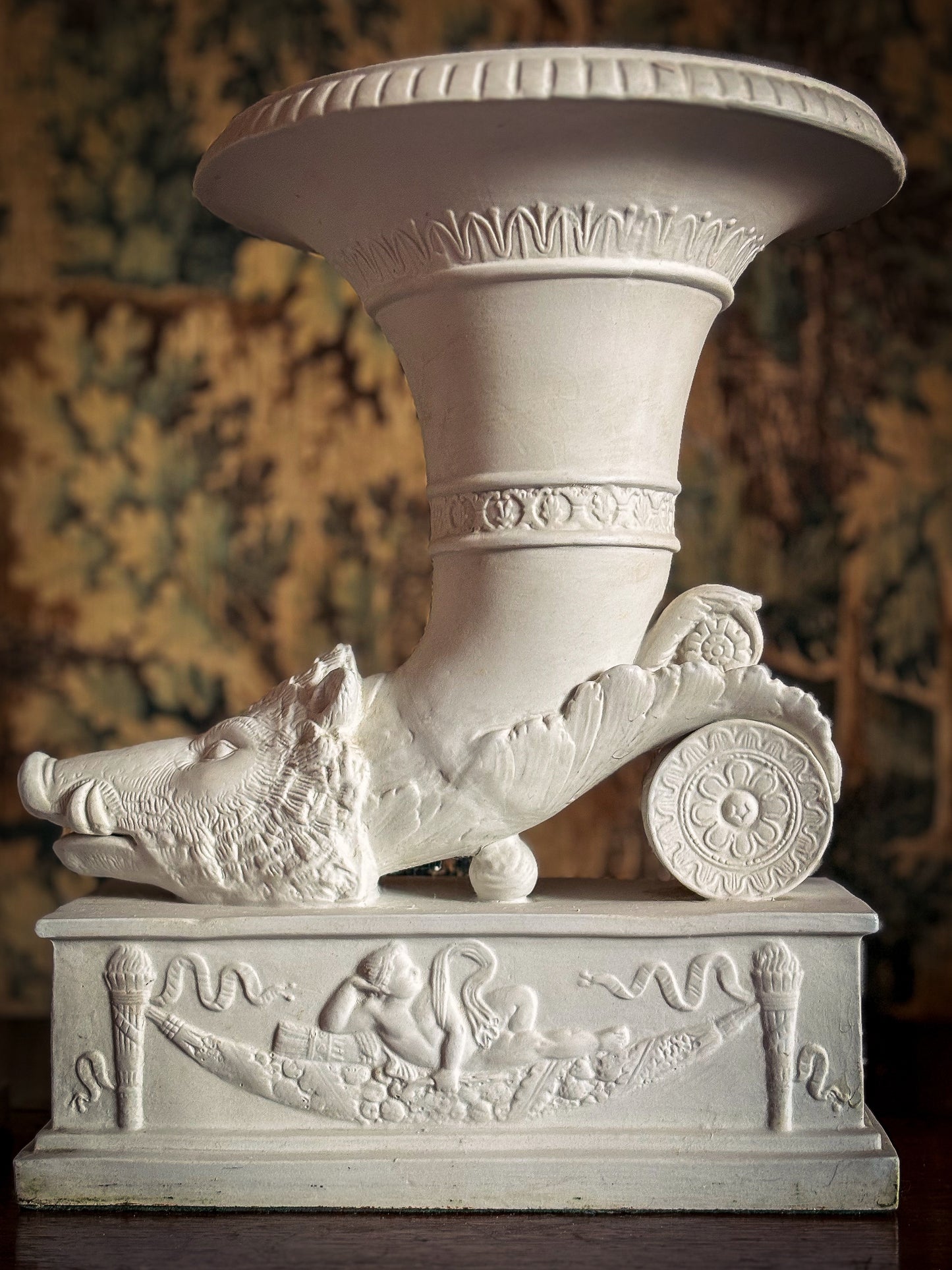 Pair of Continental biscuit porcelain ‘rhyton’ vases, probably German 19th century