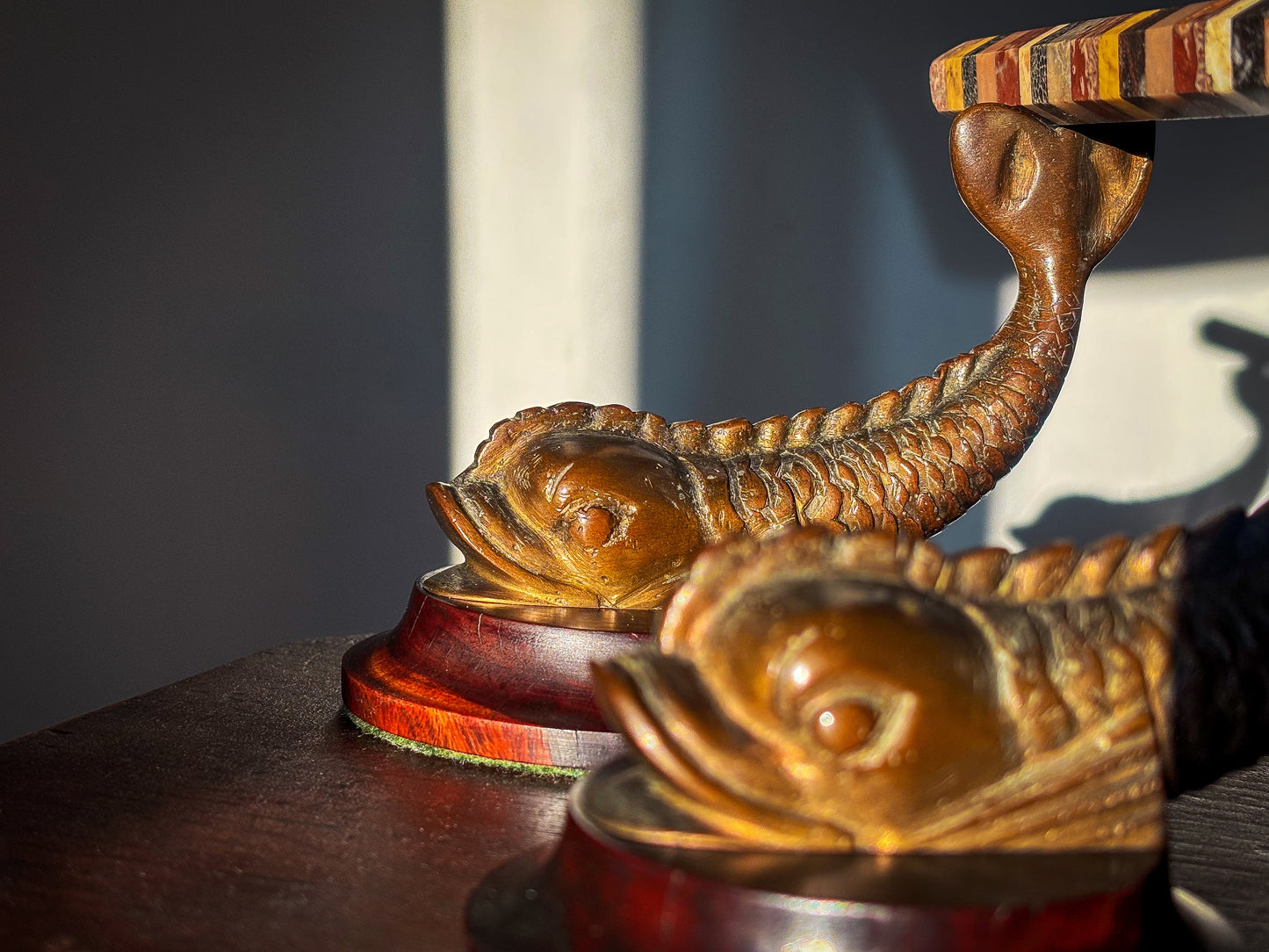 A Pair of 19th Century Classical Revival Bronze Dolphin Supports