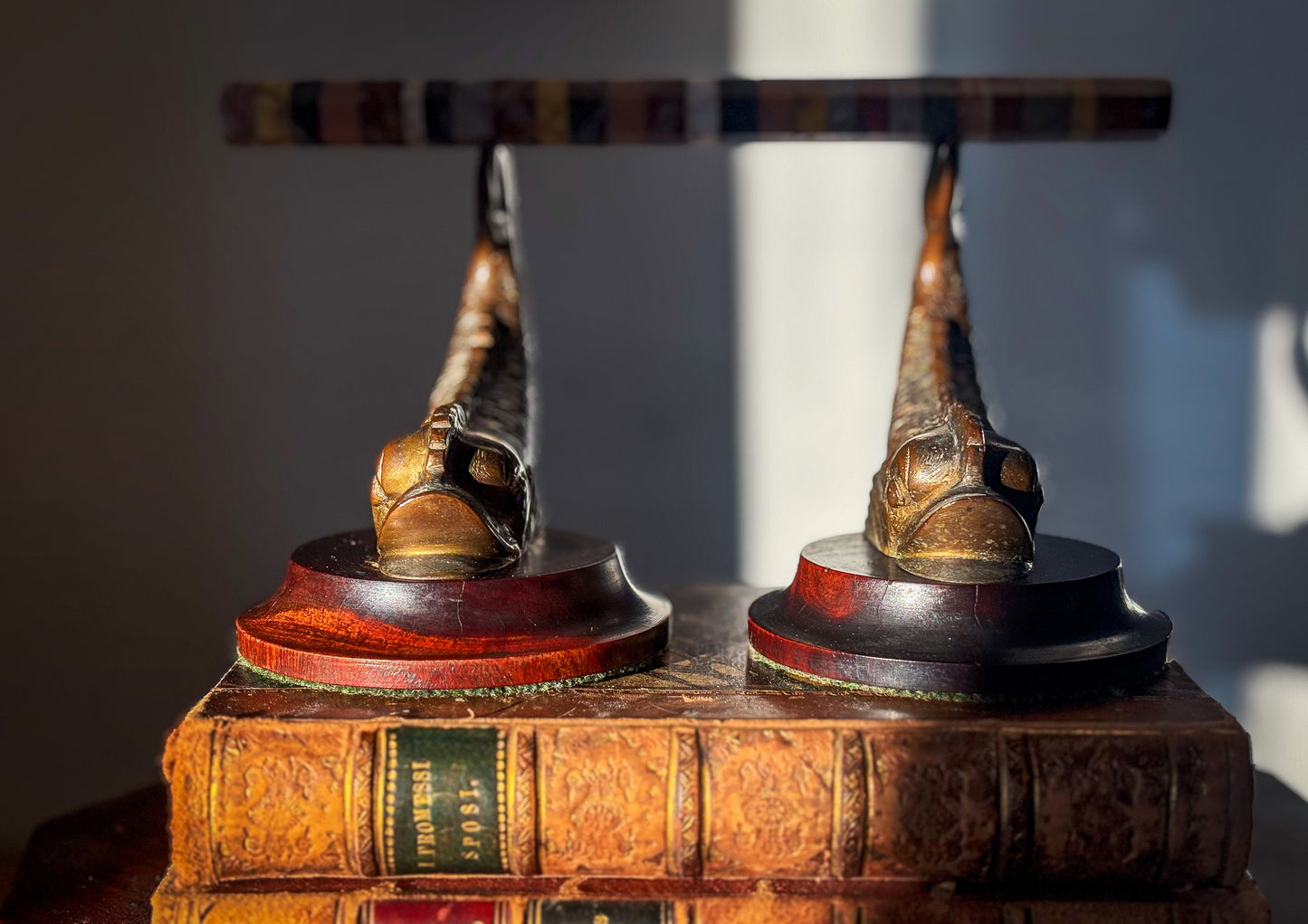 A Pair of 19th Century Classical Revival Bronze Dolphin Supports