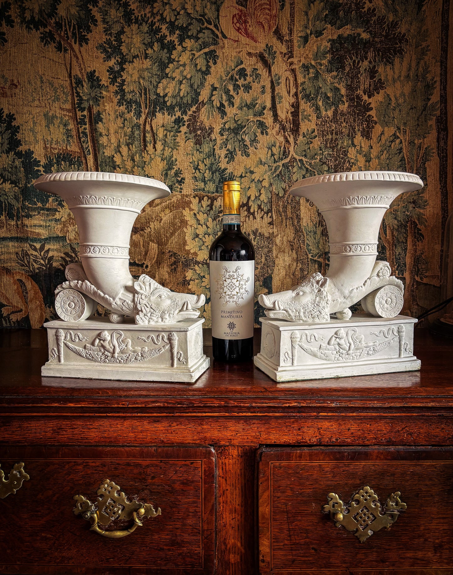 Pair of Continental biscuit porcelain ‘rhyton’ vases, probably German 19th century