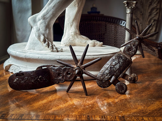Pair of Iberian Silver-Inlaid Wrought-Iron Spurs